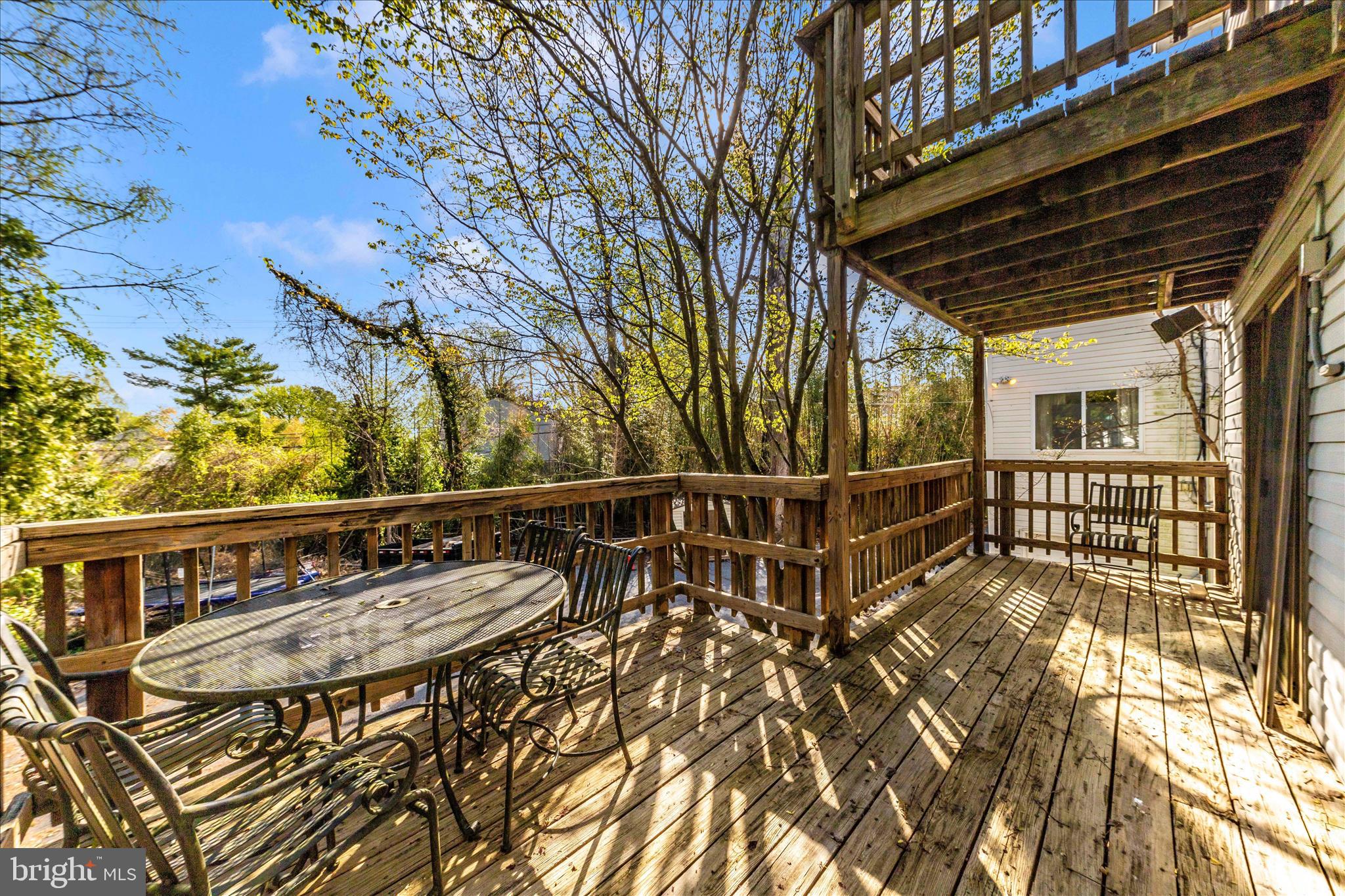 9309 Old Georgetown Road Bethesda, MD 20814 - Photo 46 of 50 a view of balcony with wooden floor and seating space