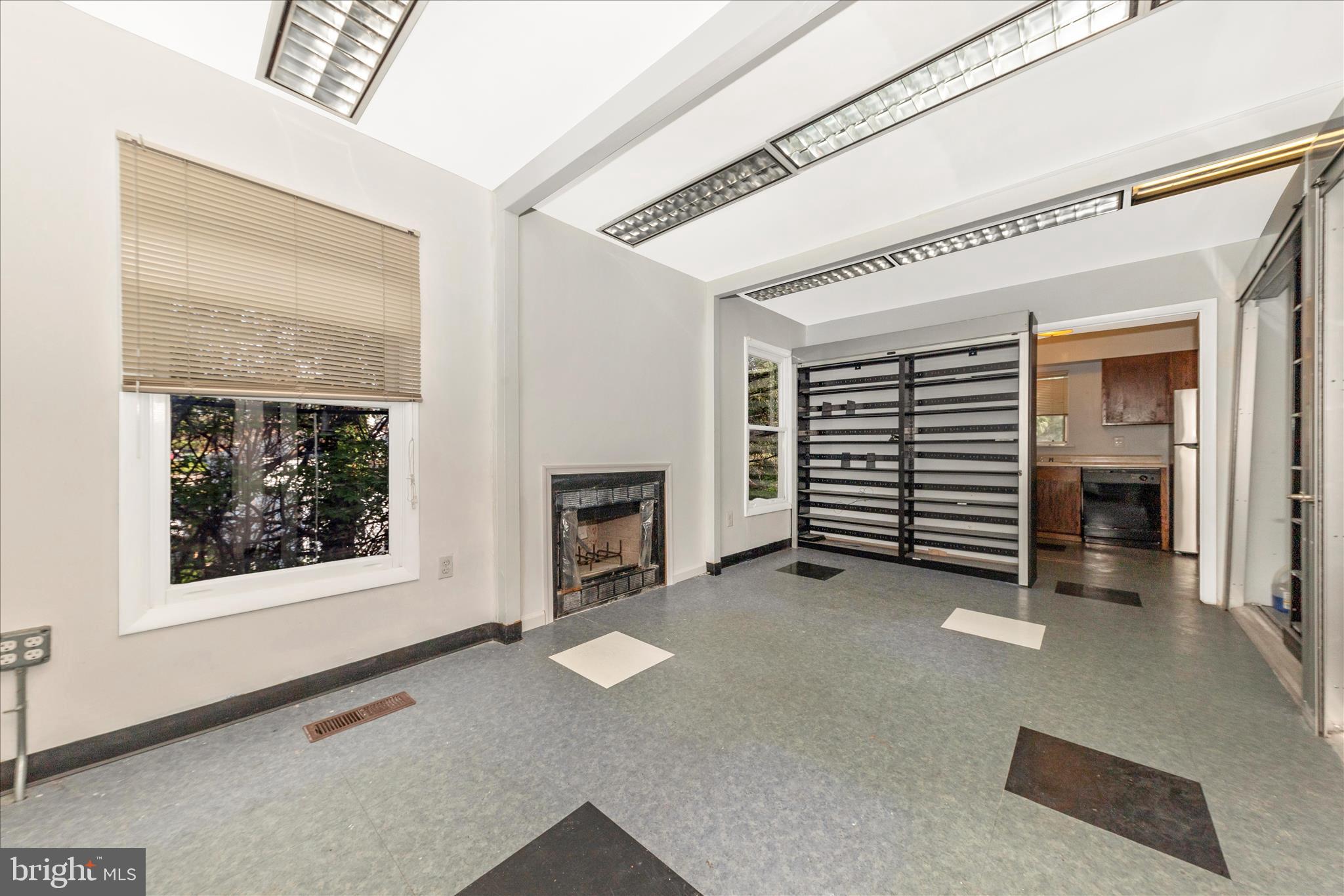 9309 Old Georgetown Road Bethesda, MD 20814 - Photo 8 of 50 a view of a livingroom with a staircase
