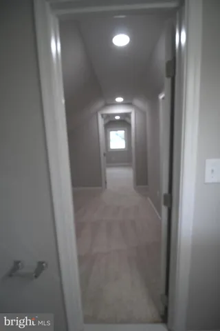 a bathroom with a sink toilet and a mirror