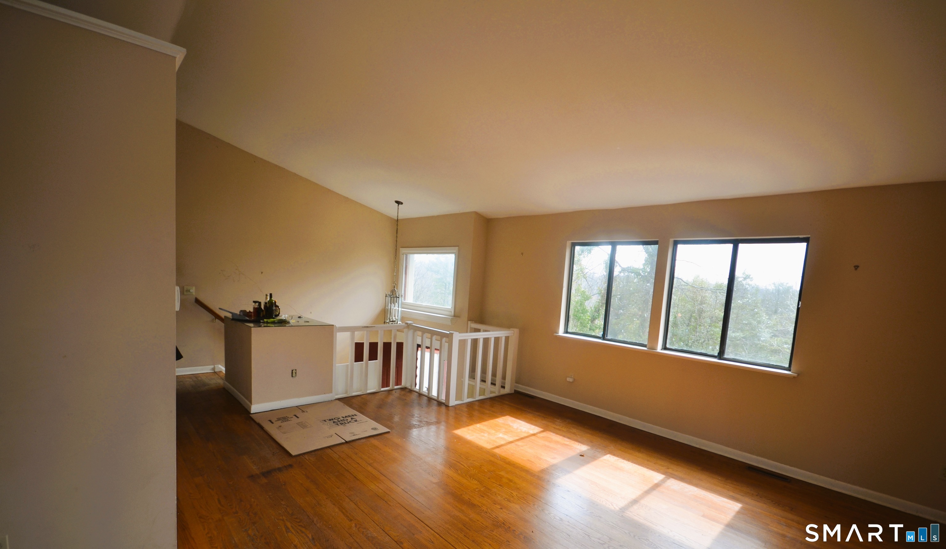 215 Saxonwood Road Fairfield, CT 06825 - Photo 6 of 24 a view of an empty room with a window