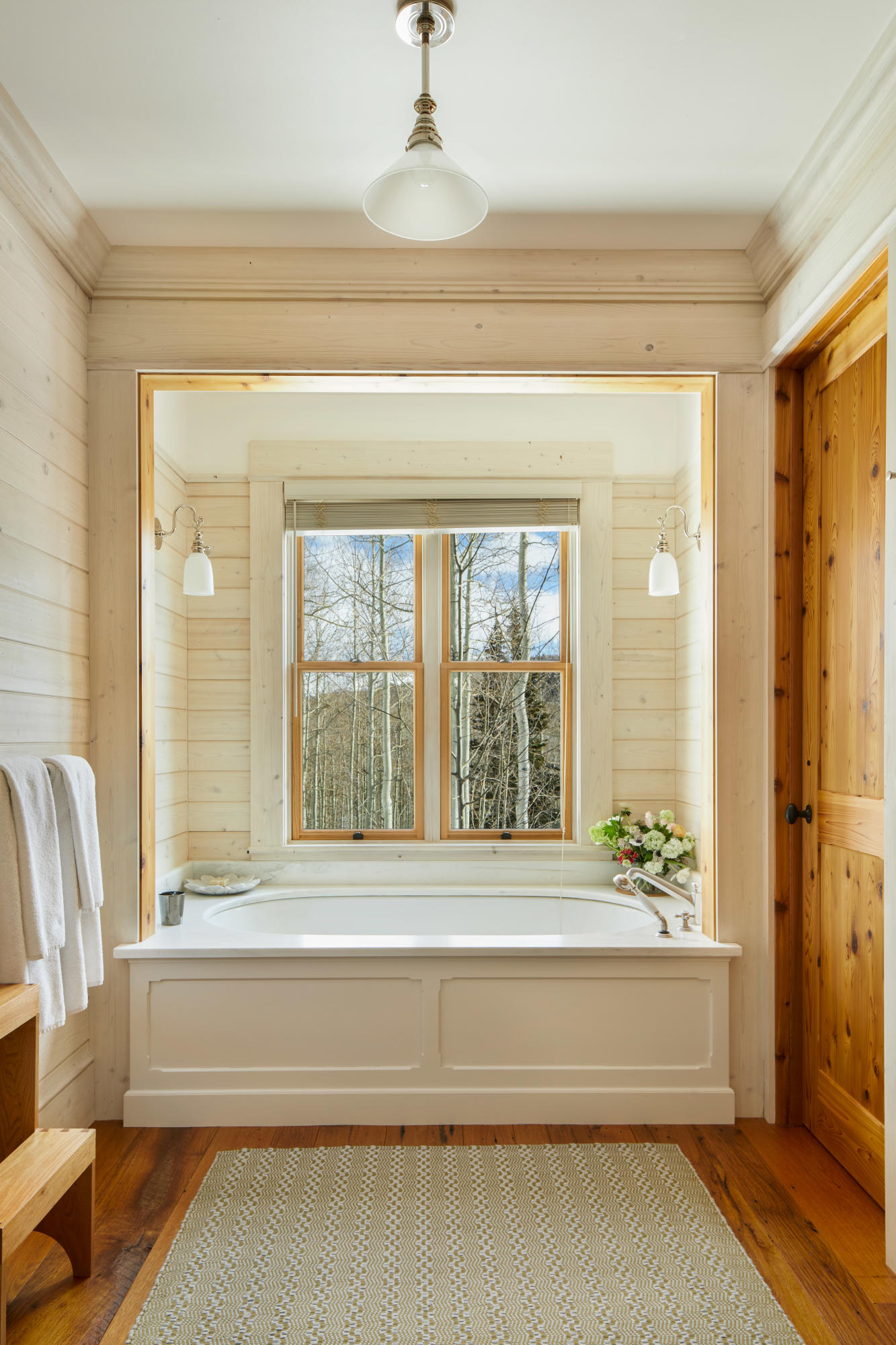 225 Raspberry Patch Road Telluride, CO 81435 - Photo 11 of 24 a spacious en suite bathroom with a tub shower and window