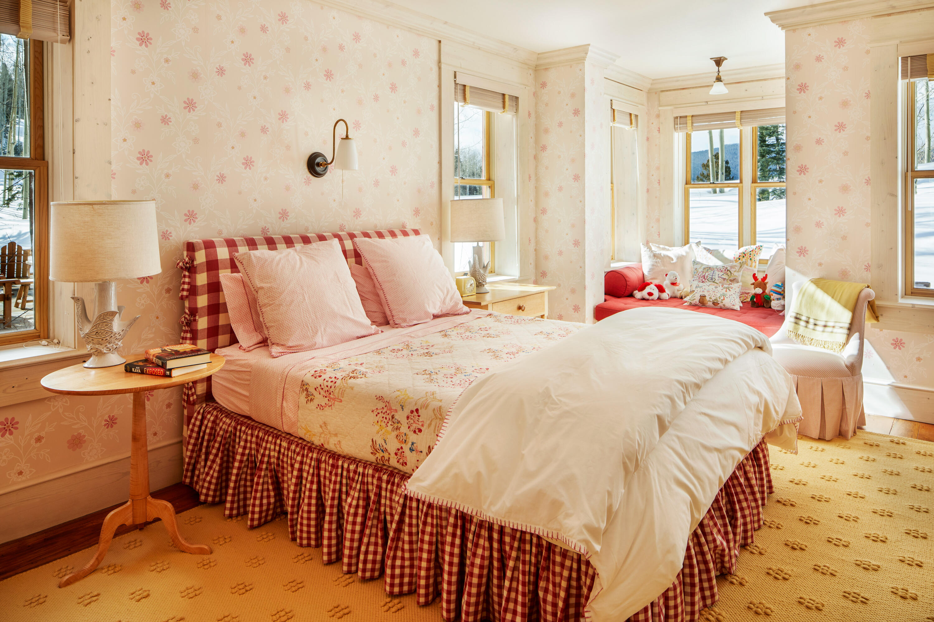 225 Raspberry Patch Road Telluride, CO 81435 - Photo 14 of 24 a bed sitting in a bedroom next to a window