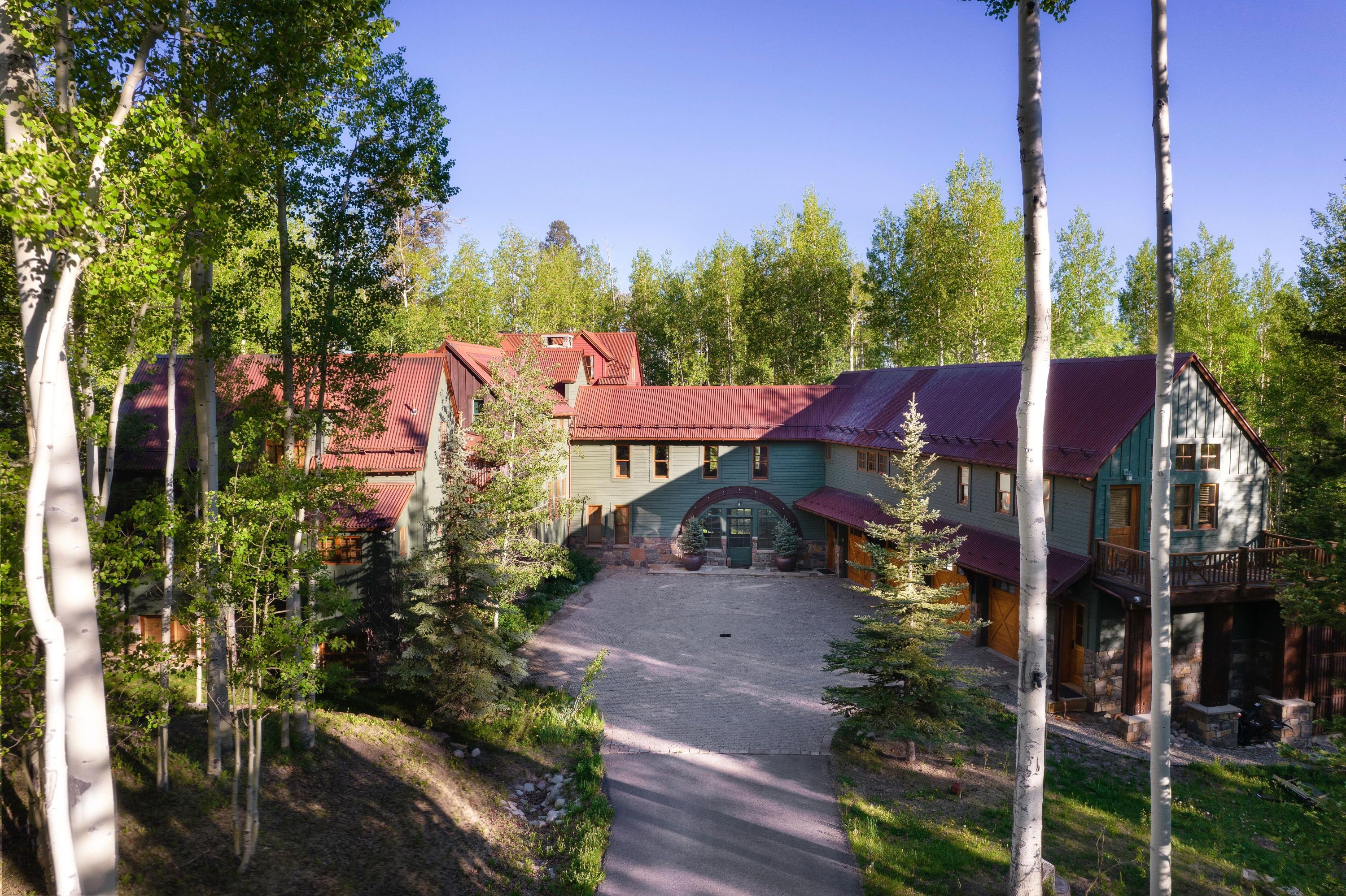 225 Raspberry Patch Road Telluride, CO 81435 - Photo 23 of 24 a view of a house with a yard and tree s