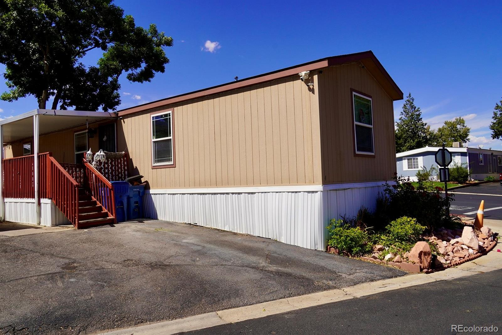9100 Tejon Street Denver, CO 80260 - Photo 21 of 23 a view of a house with a yard