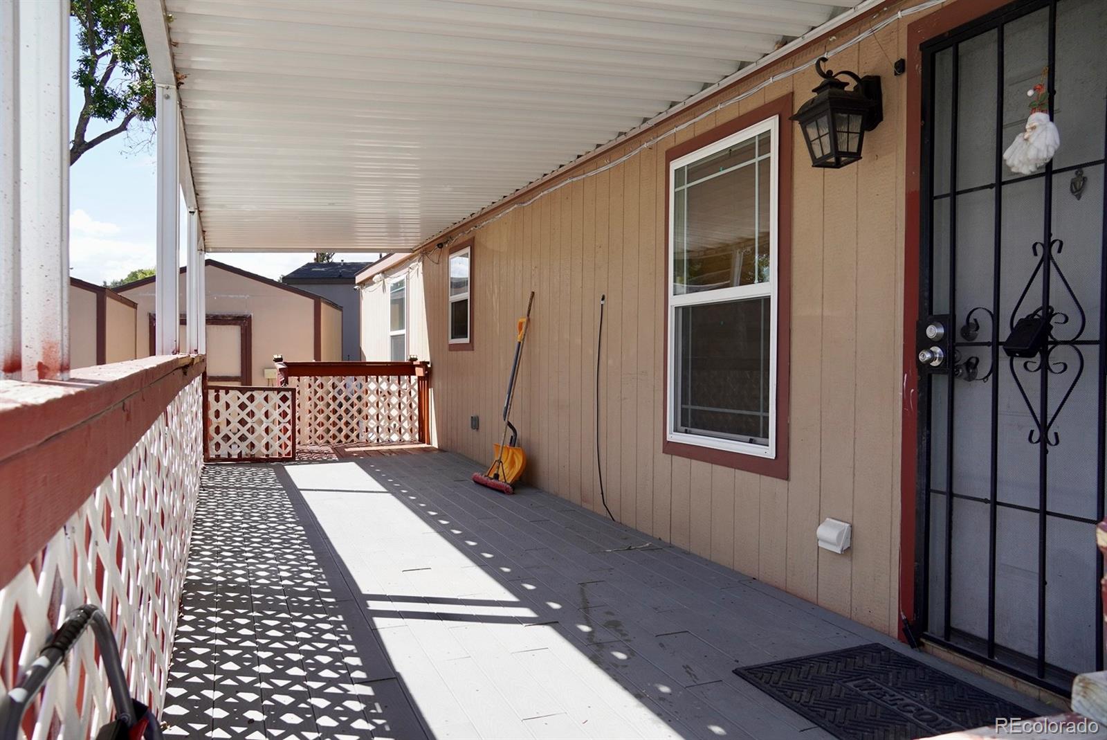 9100 Tejon Street Denver, CO 80260 - Photo 22 of 23 a view of a house with a barbeque