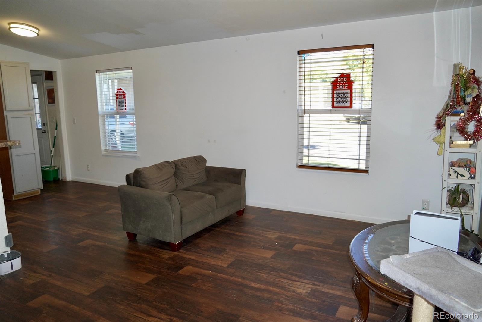 9100 Tejon Street Denver, CO 80260 - Photo 6 of 23 a living room with furniture and a window