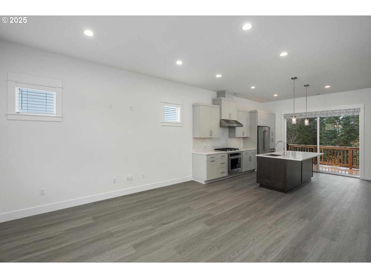 16005 Northwest Holman Way Portland, OR 97229 - Photo 11 of 48 a view of kitchen with wooden floor
