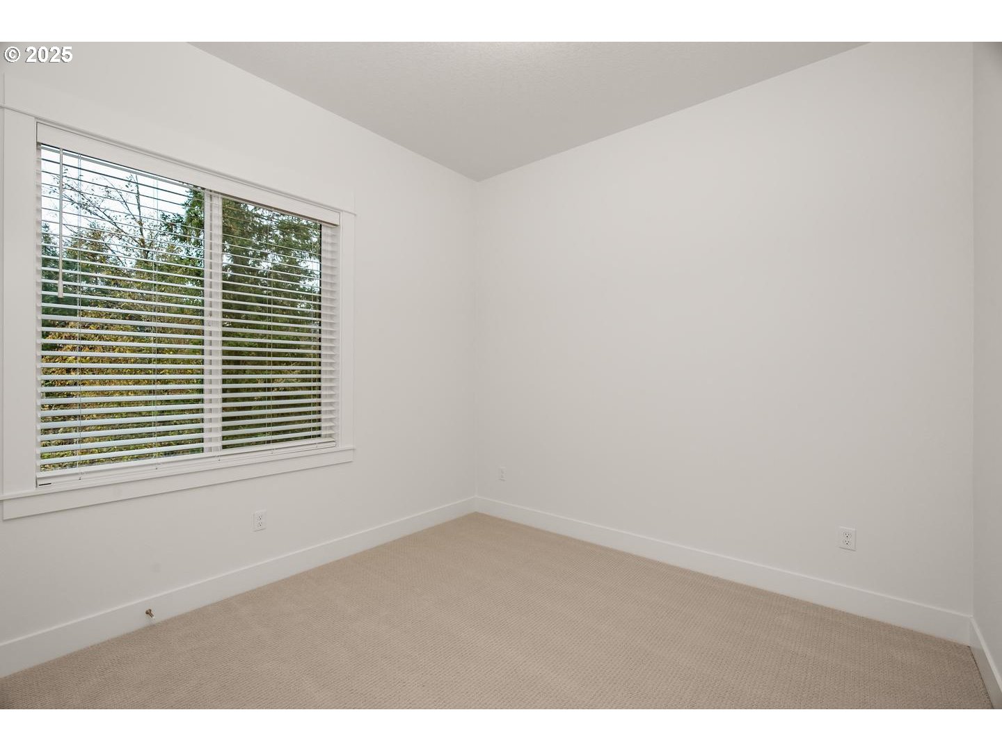 16005 Northwest Holman Way Portland, OR 97229 - Photo 15 of 48 a view of an empty room with a window