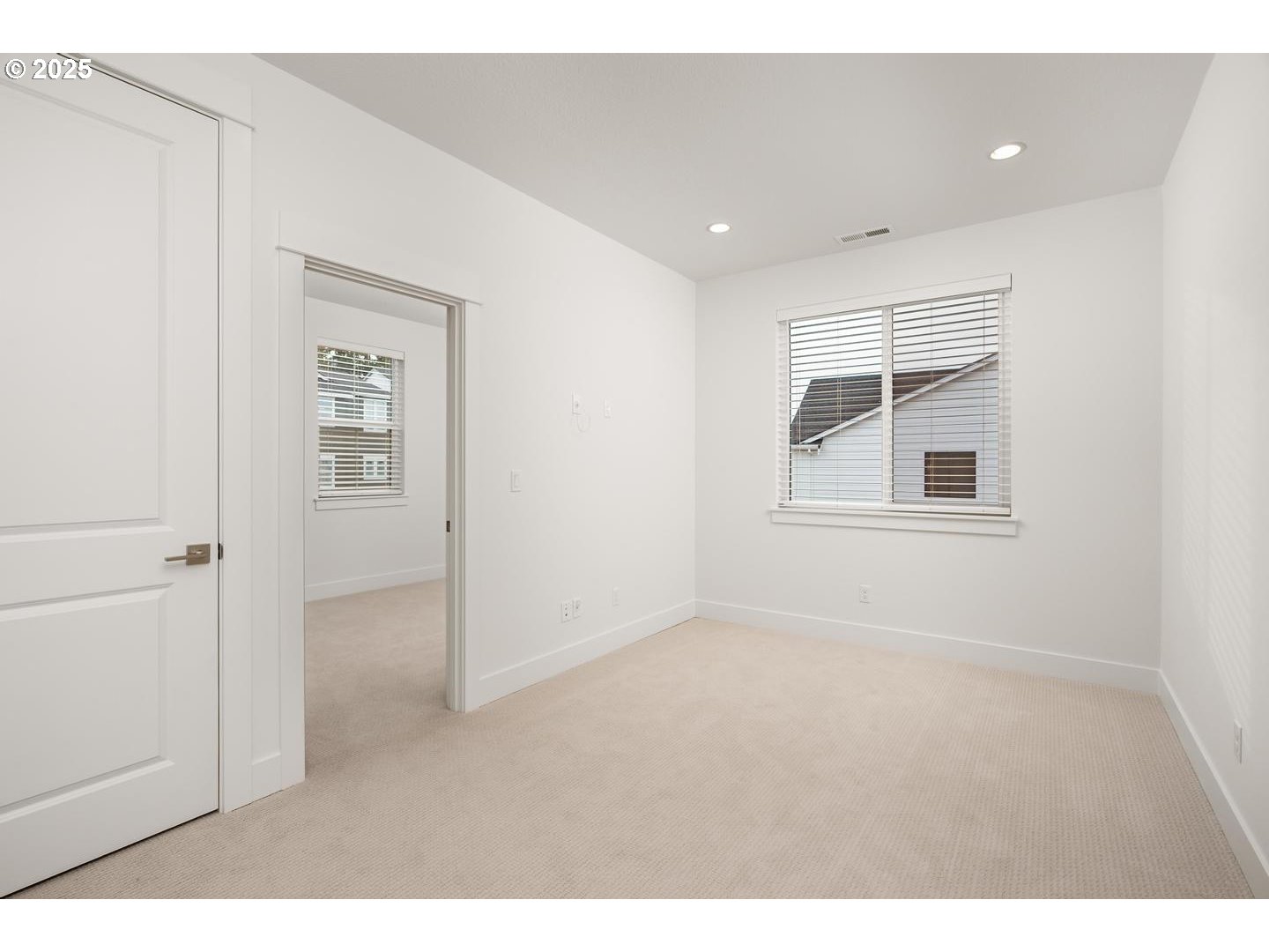 16005 Northwest Holman Way Portland, OR 97229 - Photo 18 of 48 view of empty room with windows and wardrobe