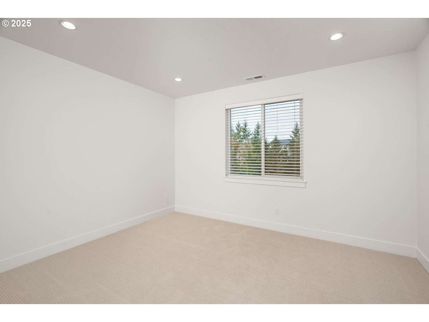 16005 Northwest Holman Way Portland, OR 97229 - Photo 19 of 48 a view of an empty room with a window