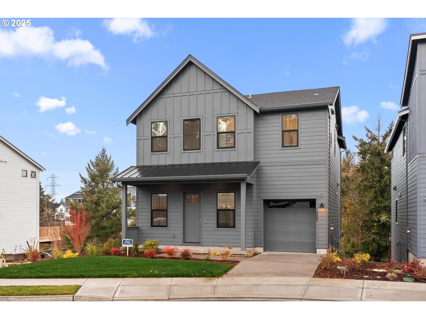 16005 Northwest Holman Way Portland, OR 97229 - Photo 2 of 48 a front view of a house with garden