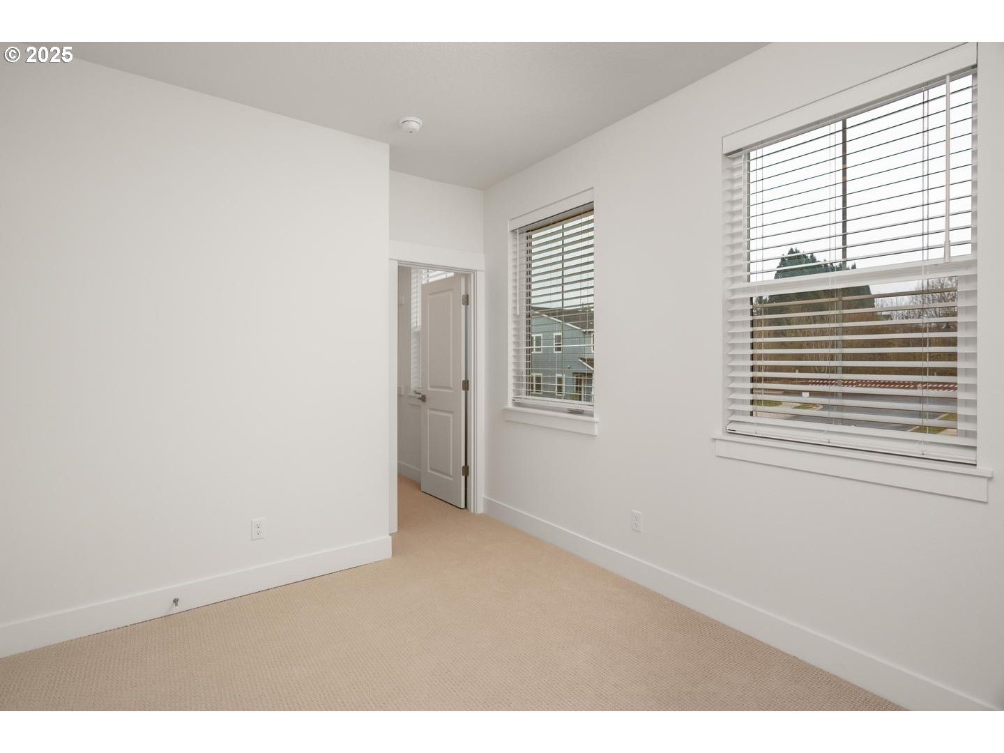16005 Northwest Holman Way Portland, OR 97229 - Photo 24 of 48 a view of an empty room with a window