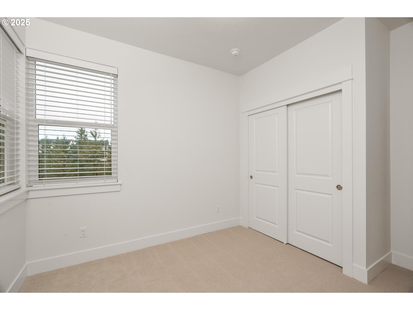 16005 Northwest Holman Way Portland, OR 97229 - Photo 27 of 48 a room that has a window in it