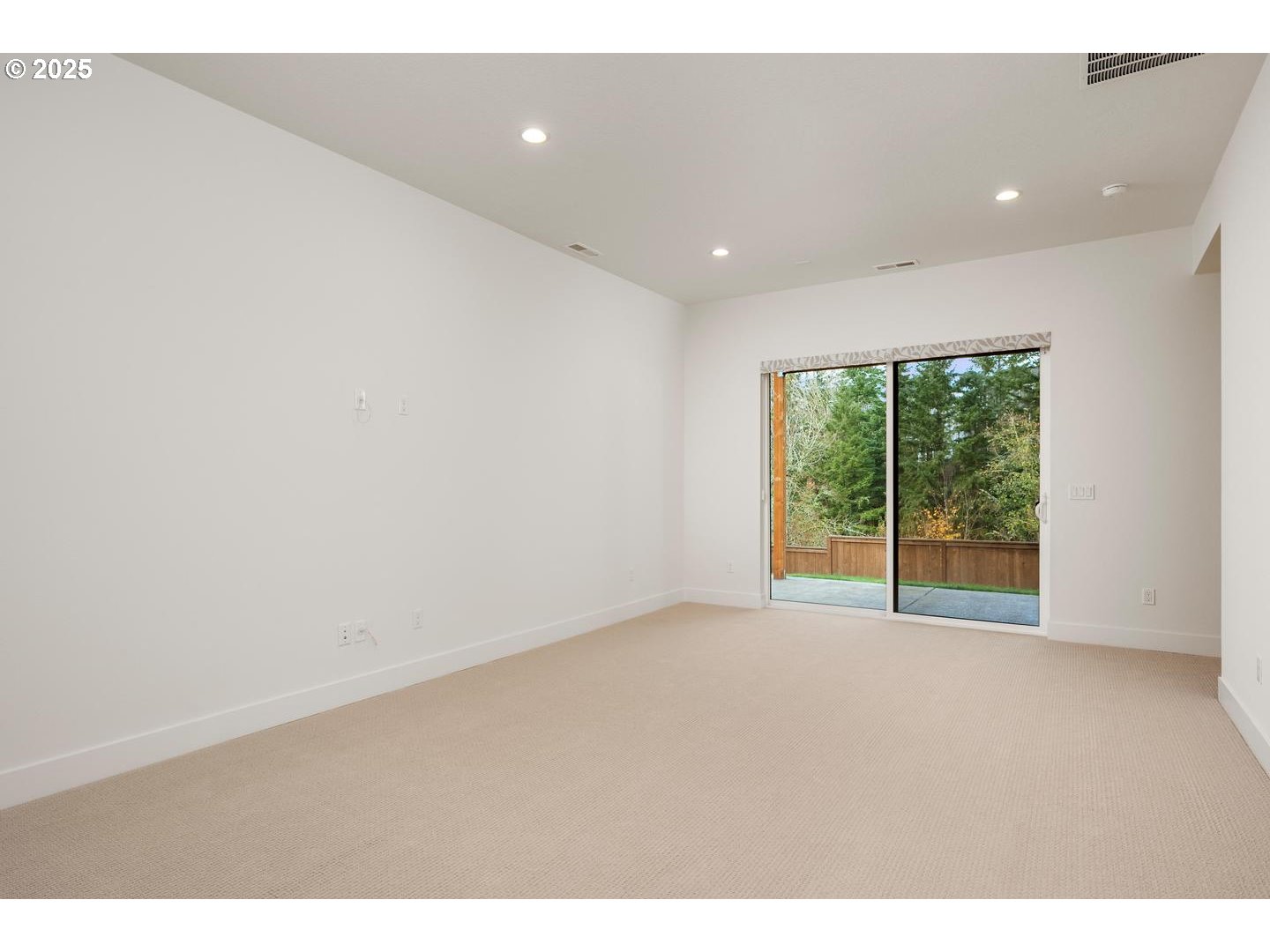 16005 Northwest Holman Way Portland, OR 97229 - Photo 29 of 48 a view of an empty room with wooden floor and a window