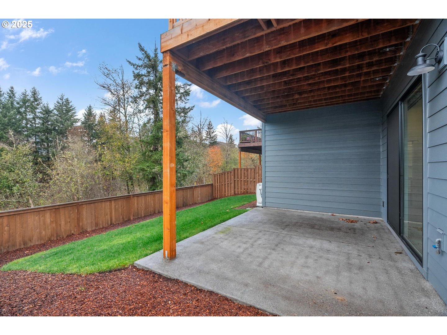 16005 Northwest Holman Way Portland, OR 97229 - Photo 38 of 48 a view of a backyard with wooden fence