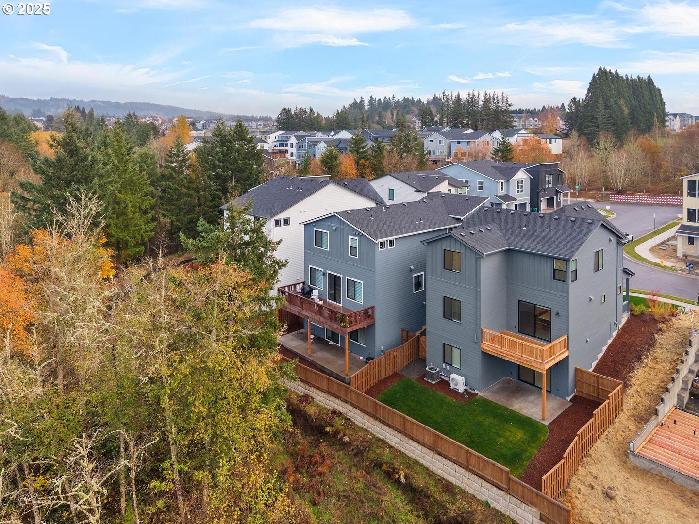 16005 Northwest Holman Way Portland, OR 97229 - Photo 43 of 48 an aerial view of house with yard and mountain view in back