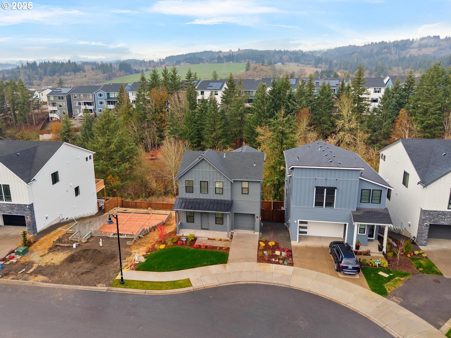 16005 Northwest Holman Way Portland, OR 97229 - Photo 46 of 48 an aerial view of a house with garden space and street view