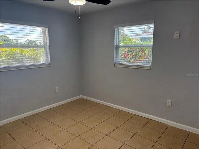 an empty room with windows