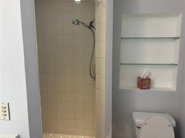 a view of an empty walk in closet