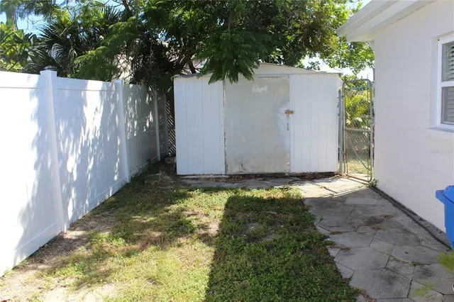 a view of a room with wooden walls