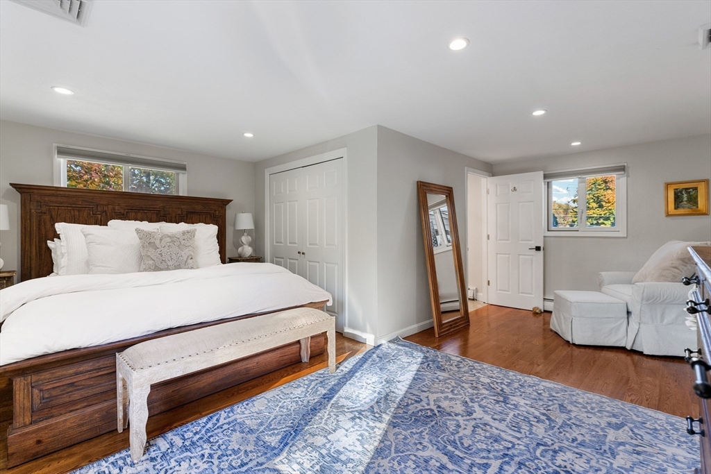 4 Senator Road Woburn, MA 01801 - Photo 12 of 36 a bed room with a bed and furniture