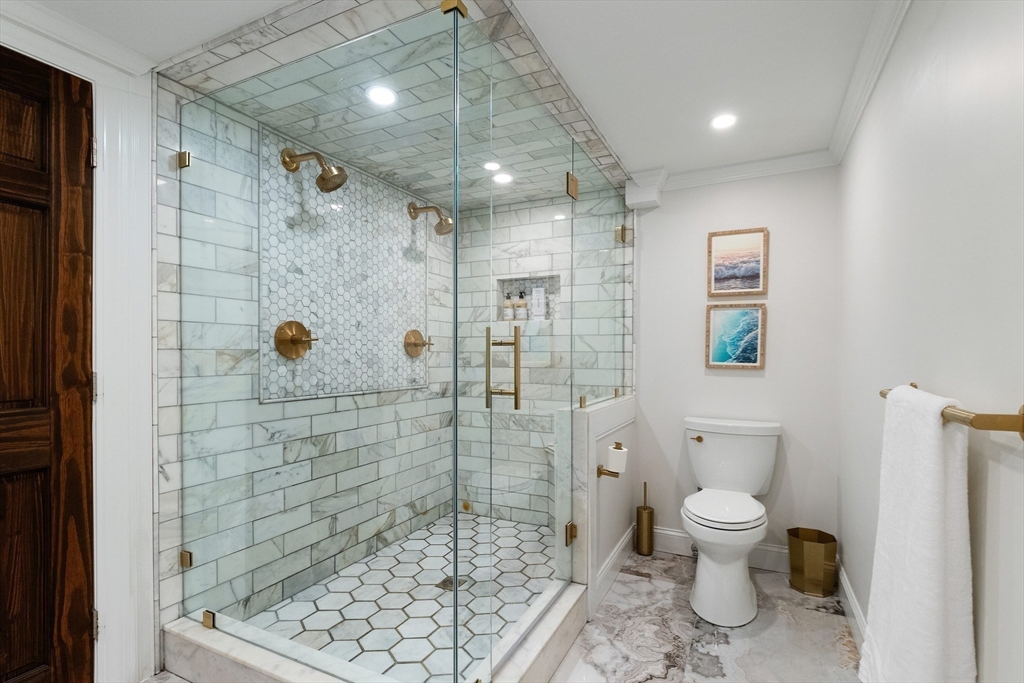 4 Senator Road Woburn, MA 01801 - Photo 21 of 36 a bathroom with a toilet and shower