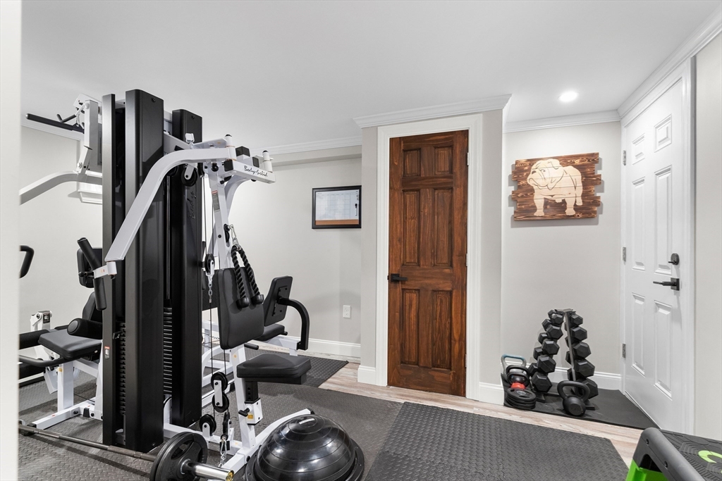 4 Senator Road Woburn, MA 01801 - Photo 23 of 36 a view of a workspace with gym equipment