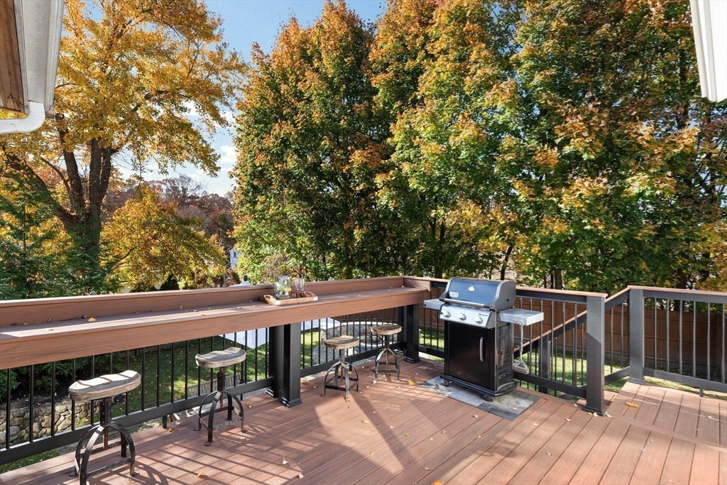 4 Senator Road Woburn, MA 01801 - Photo 27 of 36 a view of a patio with wooden floor