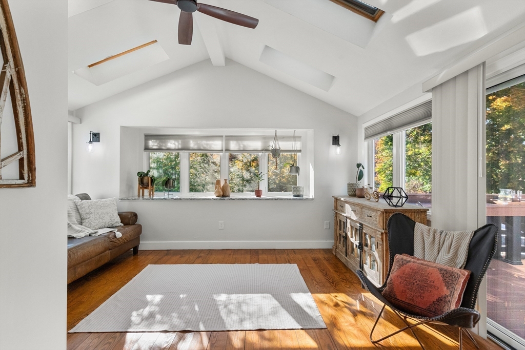 4 Senator Road Woburn, MA 01801 - Photo 10 of 36 a living room with furniture and a large window