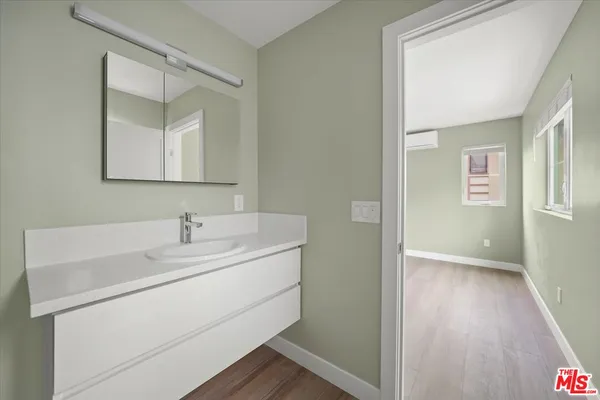 a view of a house with large windows