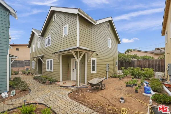 an aerial view of a city with lots of residential buildings