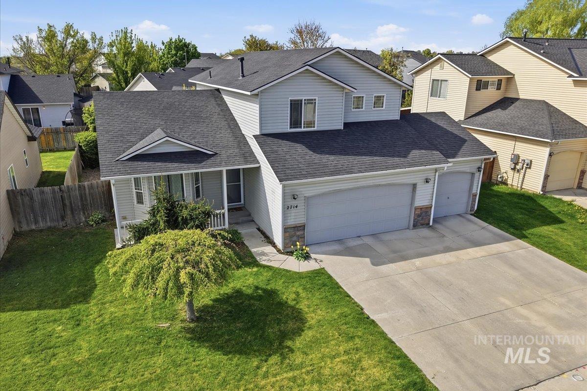 2714 Colfax Drive Caldwell, ID 83607 - Photo 1 of 40 Two-story residence featuring light gray siding with stone accents