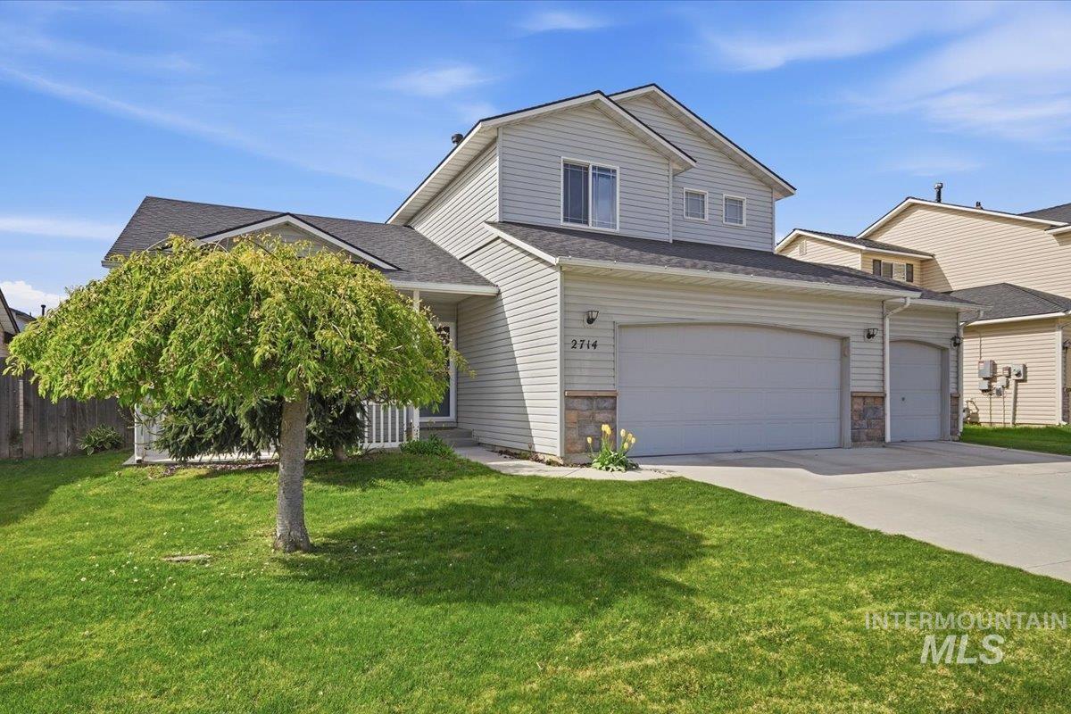 2714 Colfax Drive Caldwell, ID 83607 - Photo 31 of 40 Two-story residence featuring light-colored siding and a dark shingle roof