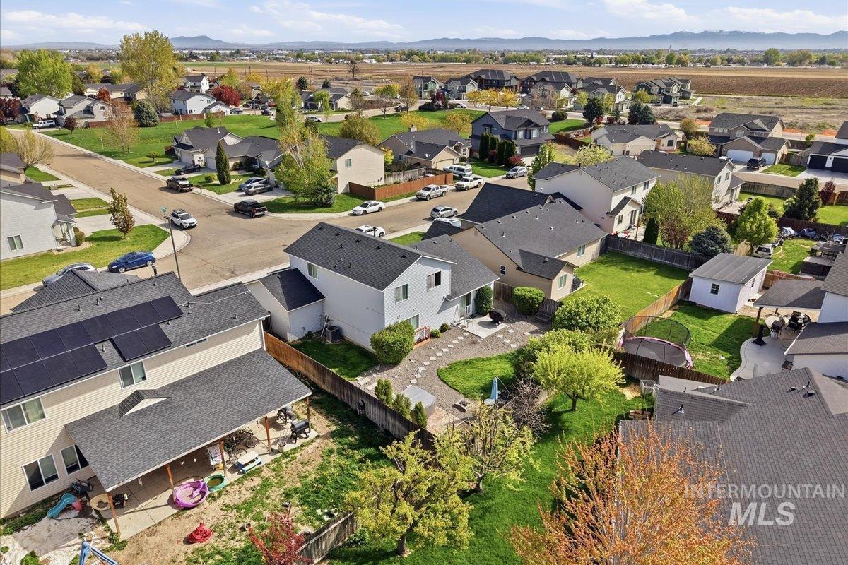 2714 Colfax Drive Caldwell, ID 83607 - Photo 39 of 40 Residential neighborhood featuring a paved street, asphalt shingle roofs, and established landscaping