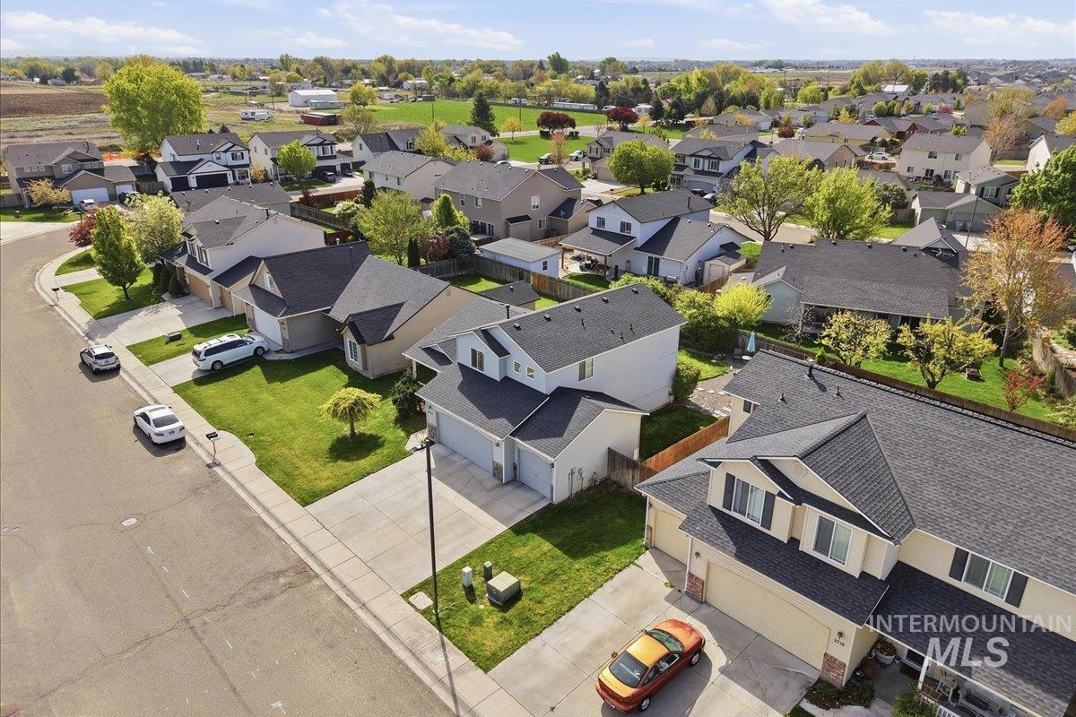 2714 Colfax Drive Caldwell, ID 83607 - Photo 40 of 40 Residential neighborhood featuring a paved street, concrete sidewalks, and individual homes with landscaped front yards