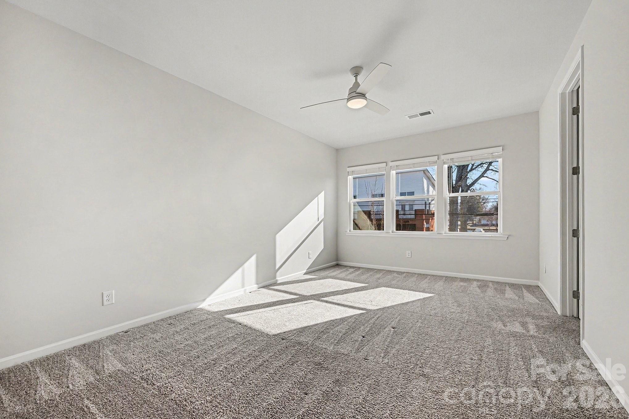 5451 Comiskey Alley Kannapolis, NC 28081 - Photo 16 of 27 a view of an empty room with a window