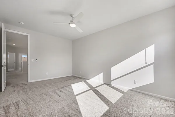 an empty room with a bathroom