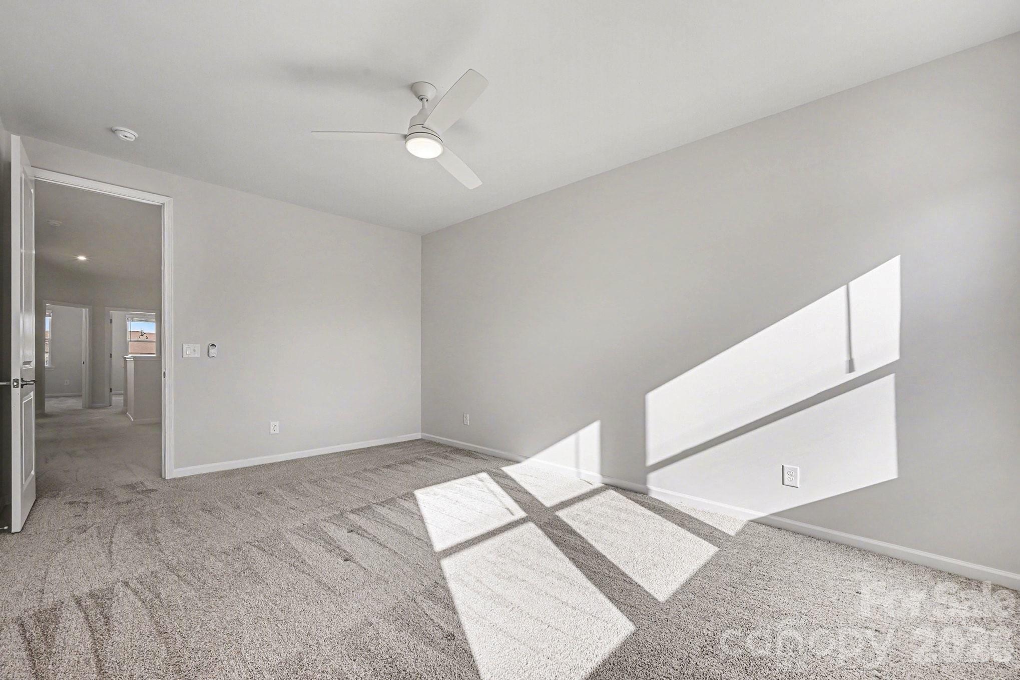 5451 Comiskey Alley Kannapolis, NC 28081 - Photo 17 of 27 an empty room with a bathroom