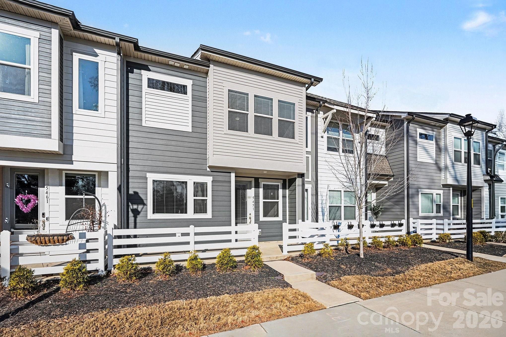 5451 Comiskey Alley Kannapolis, NC 28081 - Photo 2 of 27 a view of a house with a patio