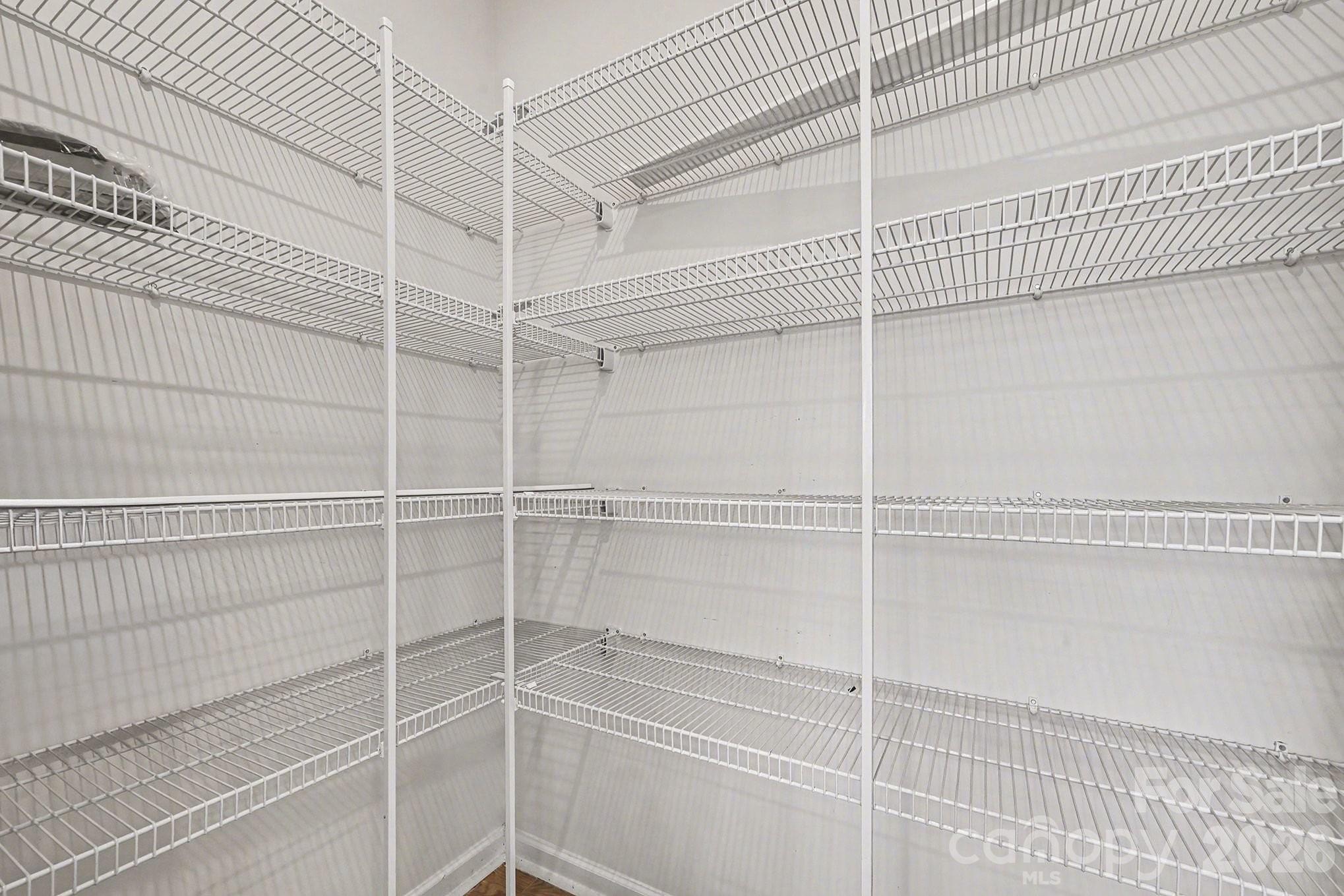 5451 Comiskey Alley Kannapolis, NC 28081 - Photo 25 of 27 a view of a room with shelves