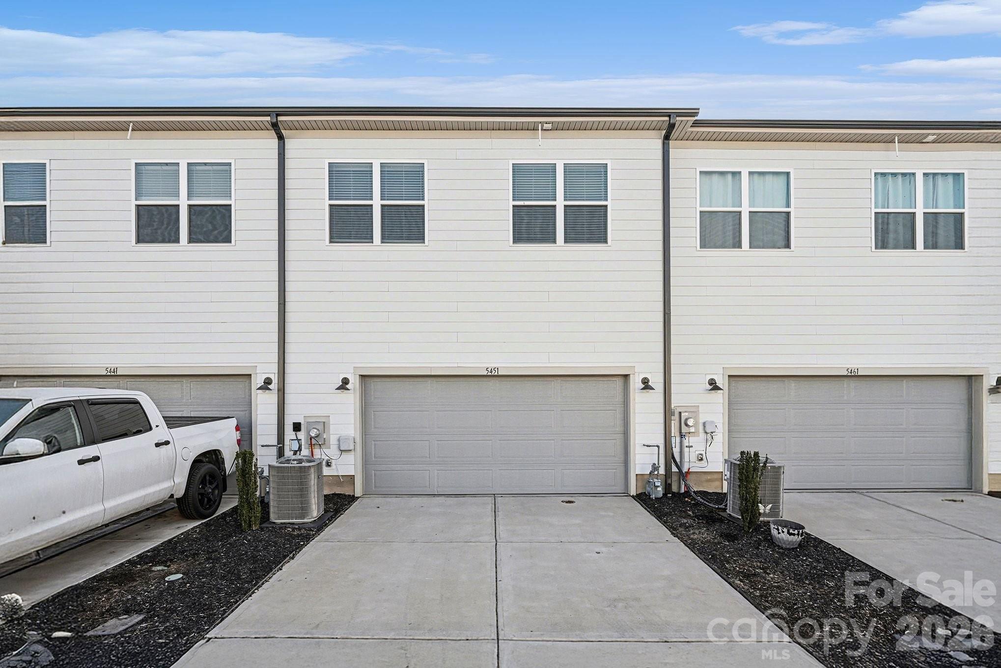 5451 Comiskey Alley Kannapolis, NC 28081 - Photo 27 of 27 a view of a car parked in front of a building