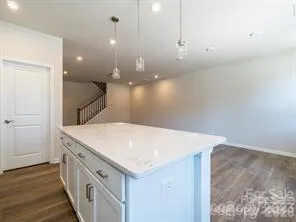 a view of a kitchen with a sink and dishwasher