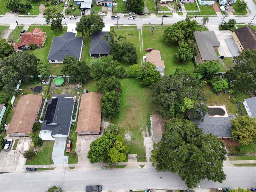 25th Street Orlando, FL 32805 - Photo 2 of 4 an aerial view of a house with outdoor space and lake view