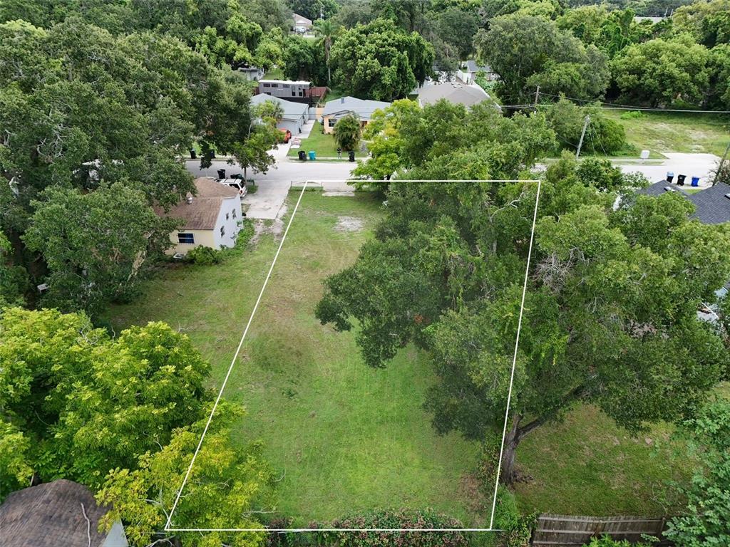 25th Street Orlando, FL 32805 - Photo 4 of 4 an aerial view of residential houses with outdoor space and trees