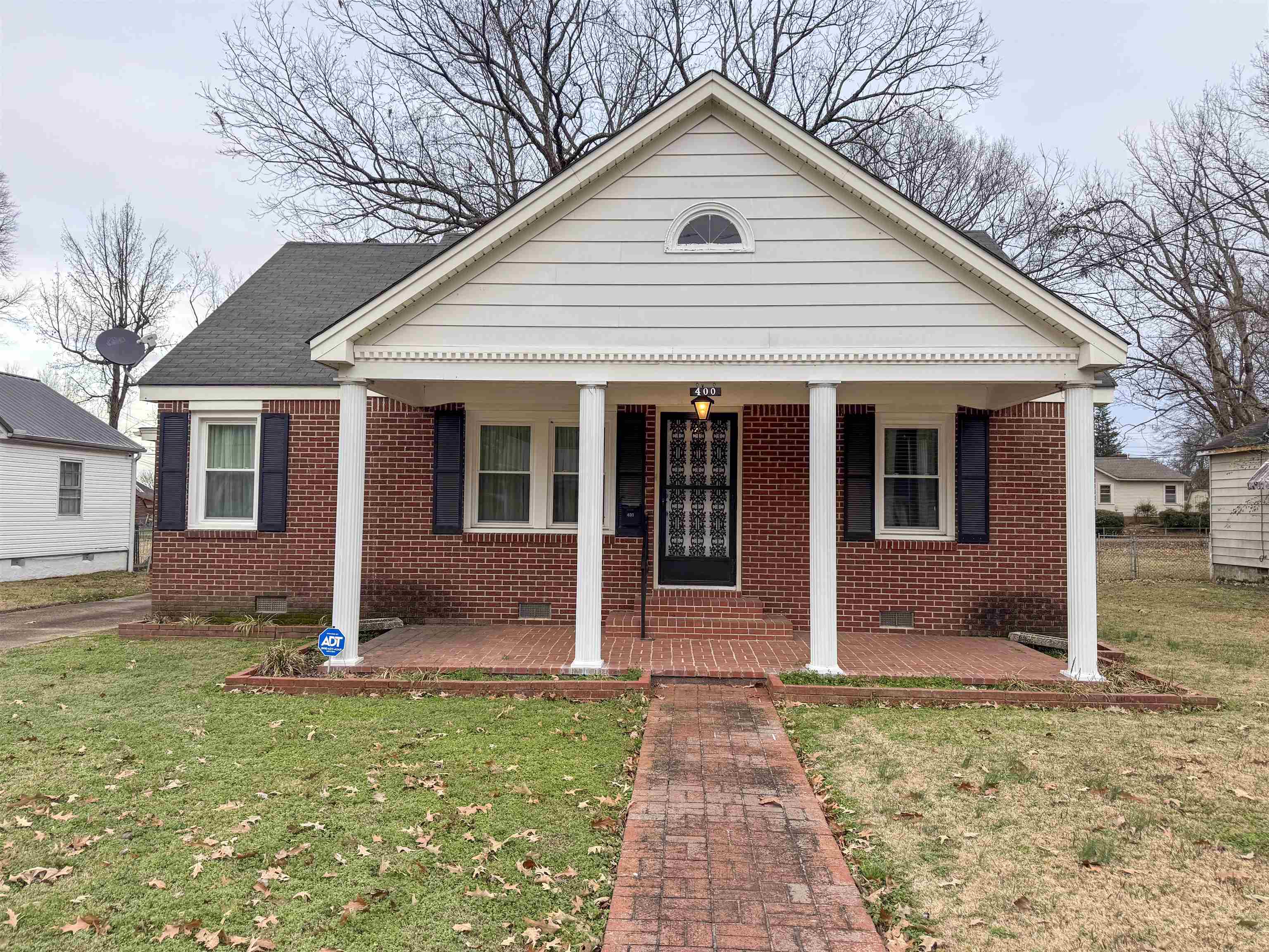 400 Park Street Covington, TN 38019 - Photo 1 of 24 a view of front of house with a yard