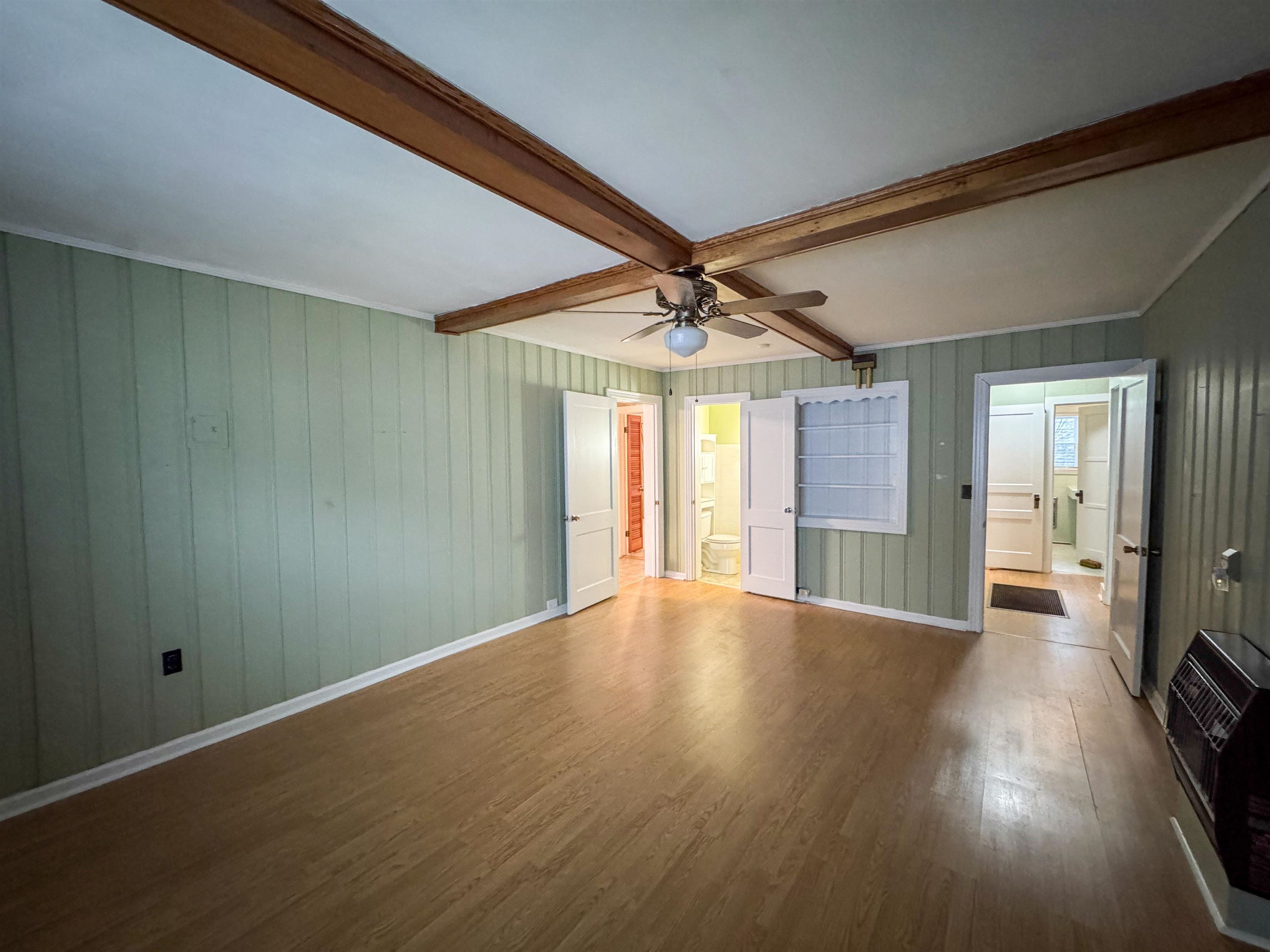 400 Park Street Covington, TN 38019 - Photo 16 of 24 a view of livingroom with hardwood floor and ceiling fan