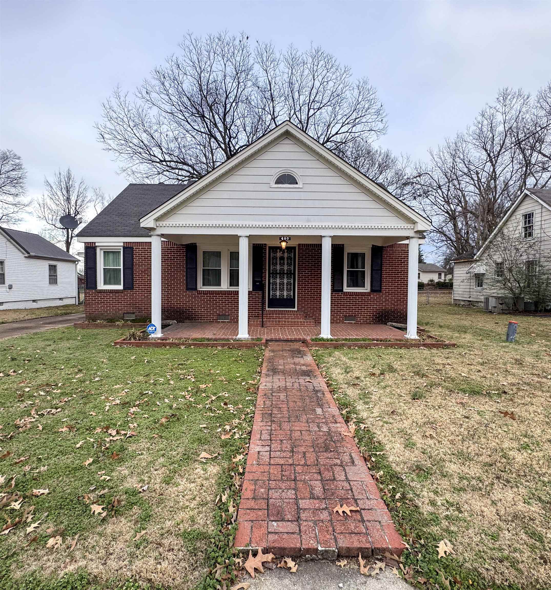 400 Park Street Covington, TN 38019 - Photo 2 of 24 a view of a house with a yard