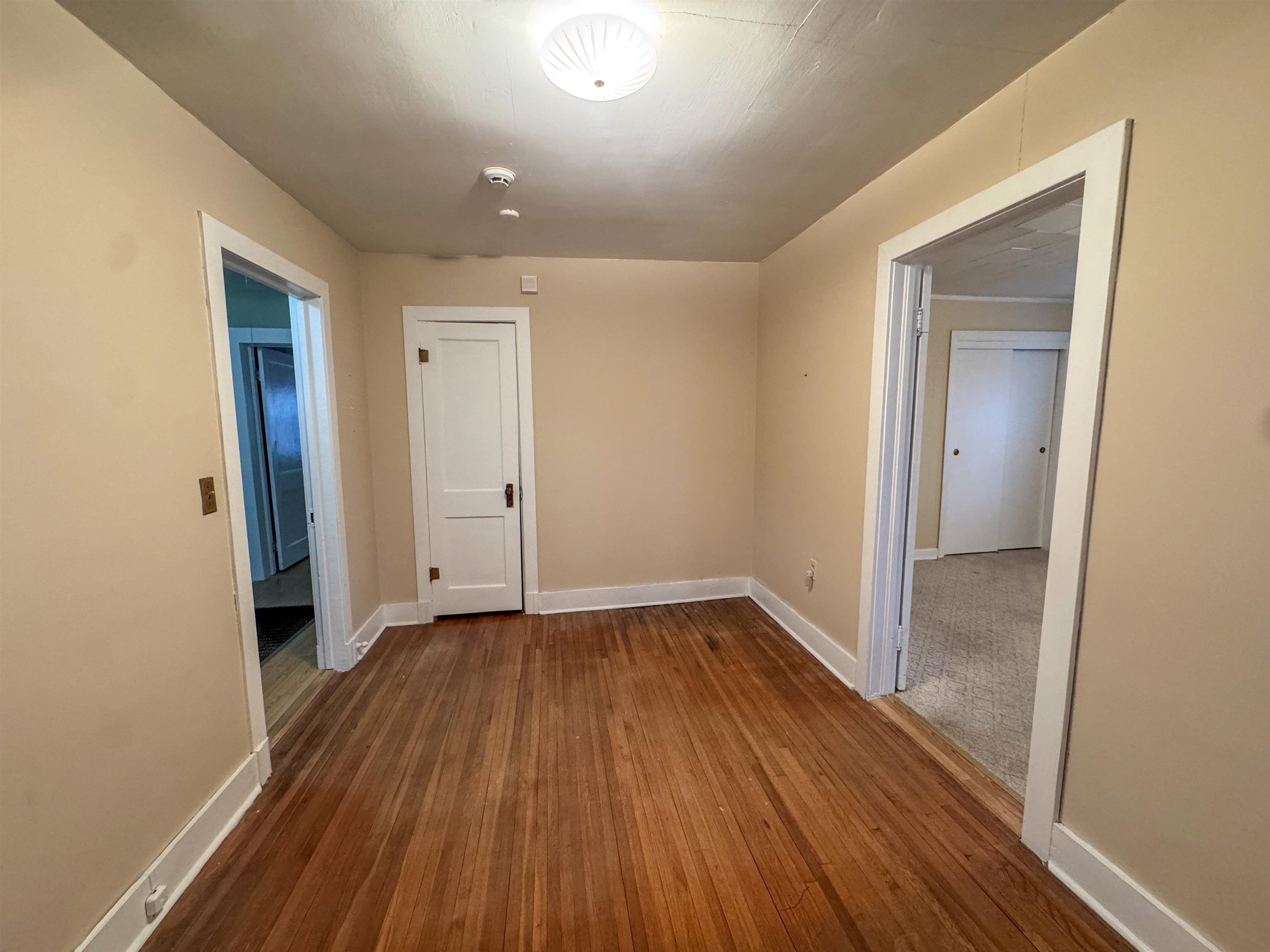 400 Park Street Covington, TN 38019 - Photo 10 of 24 a view of a hallway with wooden floor