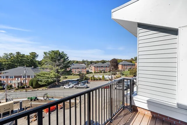 a view of a balcony with city view