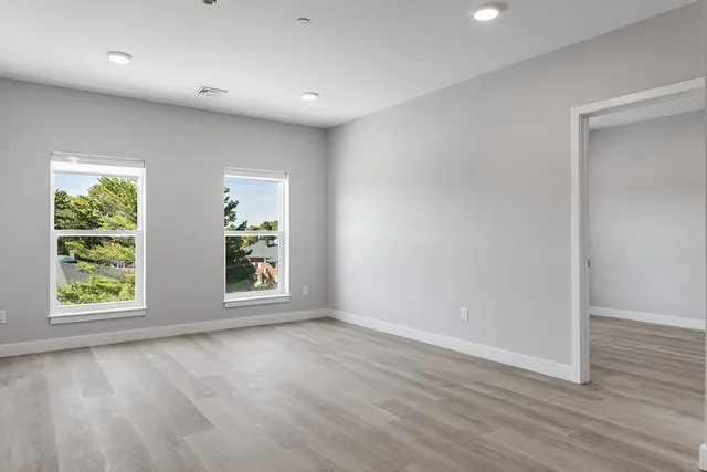 an empty room with windows